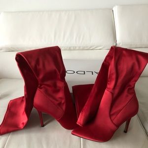Red thigh high boots